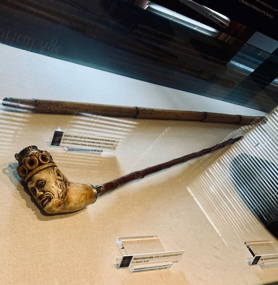 Sir Walter Scott's walking stick (top) and Meerschaum pipe as displayed at The Writers' Museum, Edinburgh