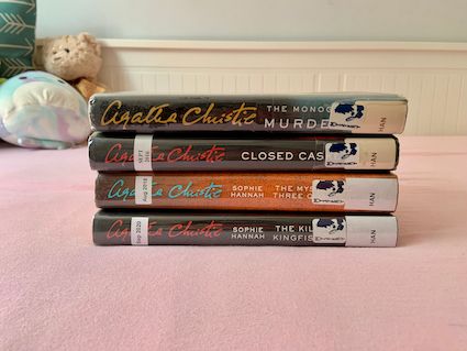 stack of four Hercule Poirot books by Sophie Hannah