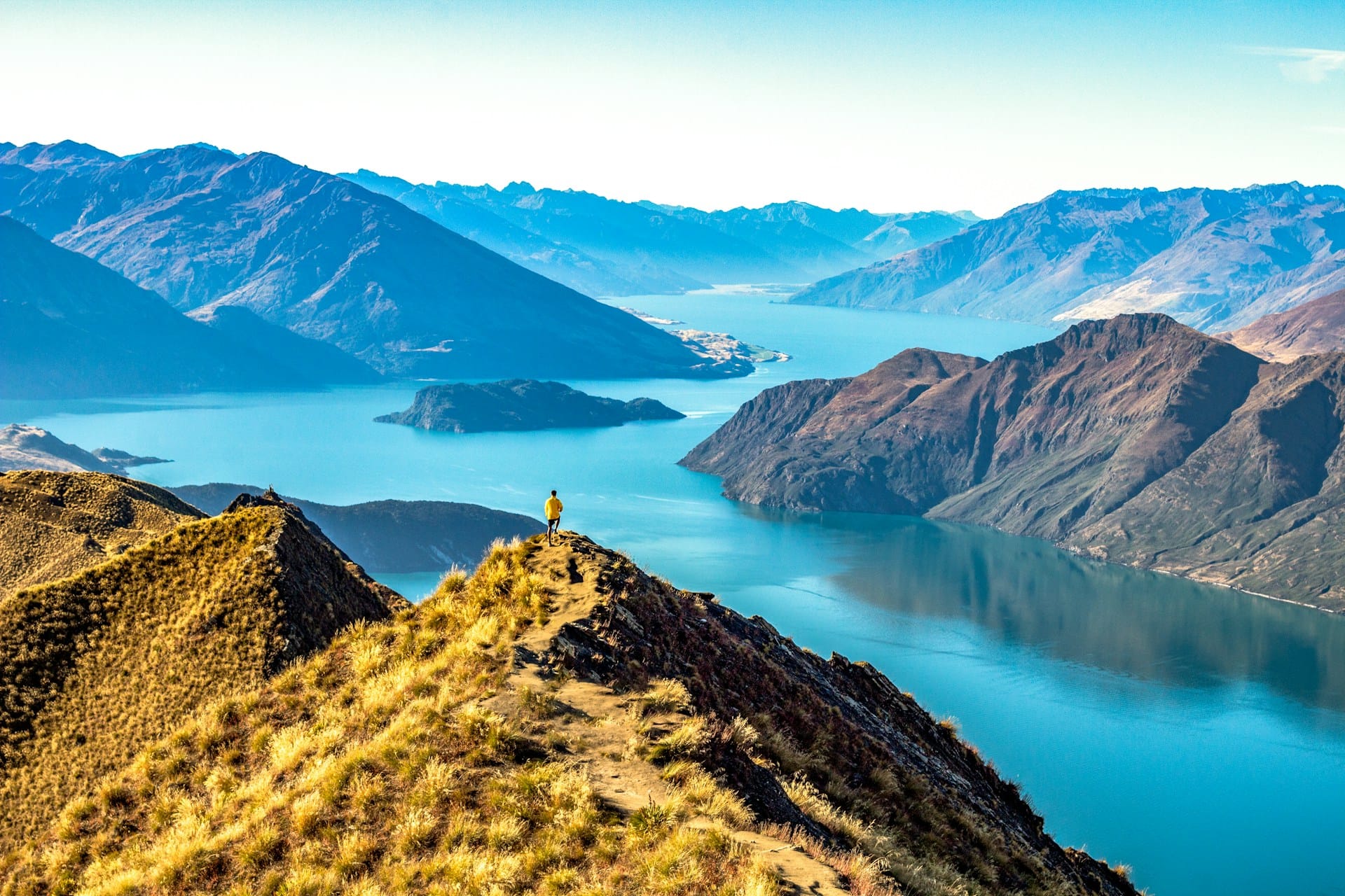 blue lake amid mountain ranges