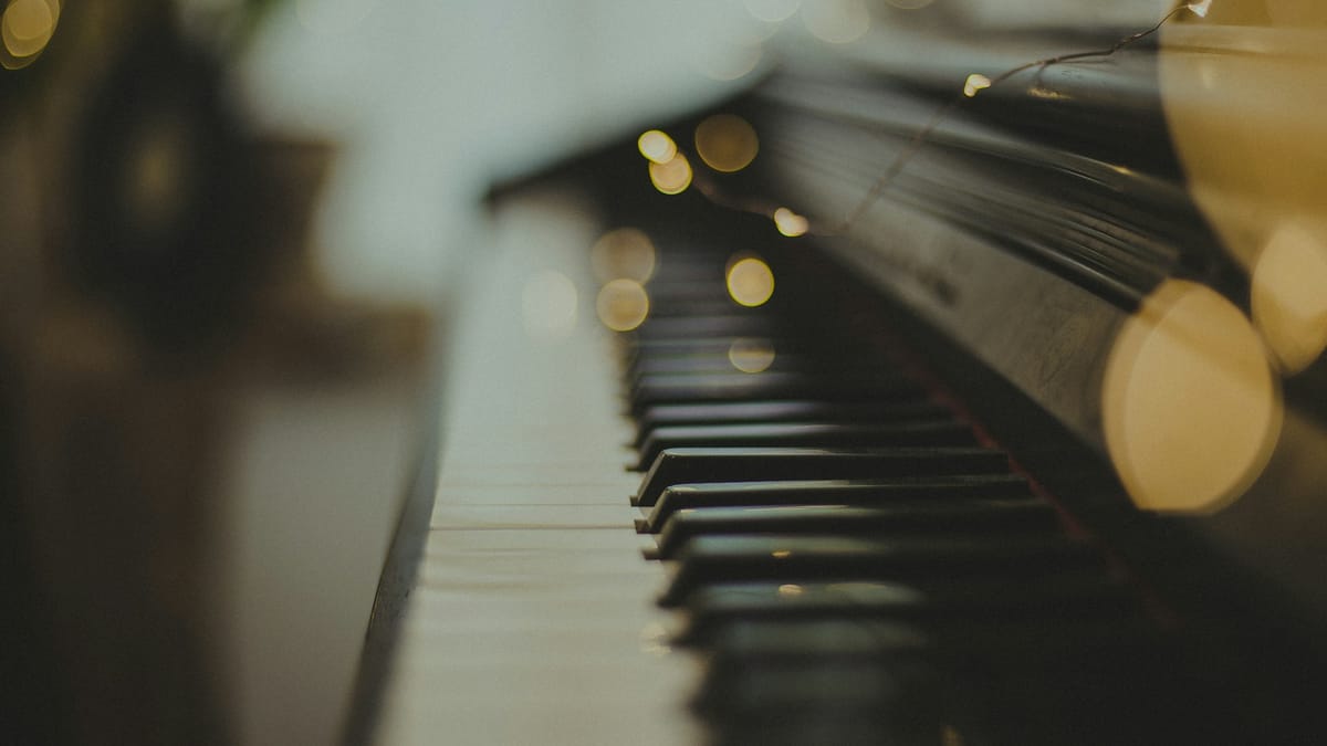piano keys against bokey lights