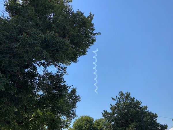 skywriting in the blue sky
