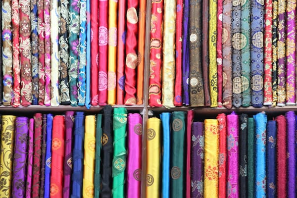 vibrant and colourful bolts of fabric