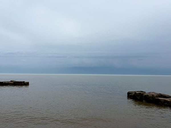 Lake Ontario with grey waters under a grey sky