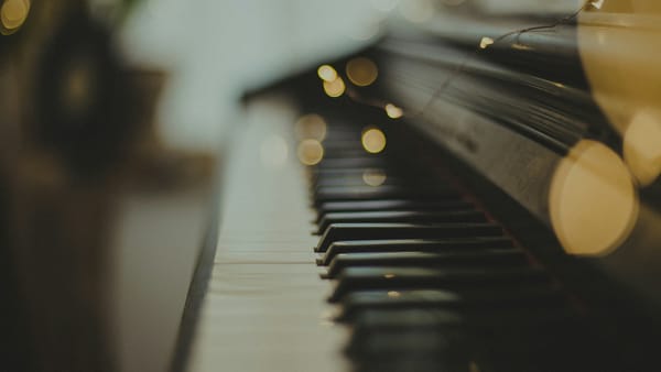 piano keys against bokey lights