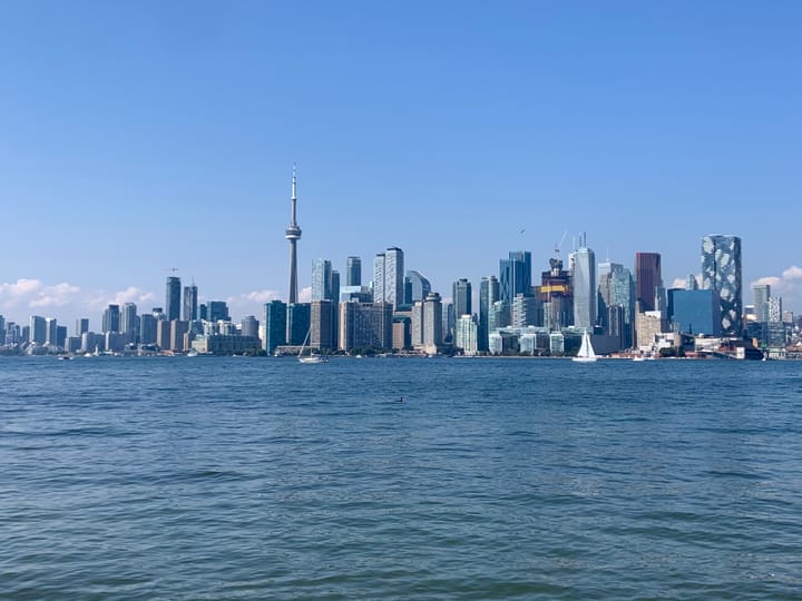 Toronto skyline as viewed from the Centre Island, featuring the CN Tower and a slew of modern skyscrapers