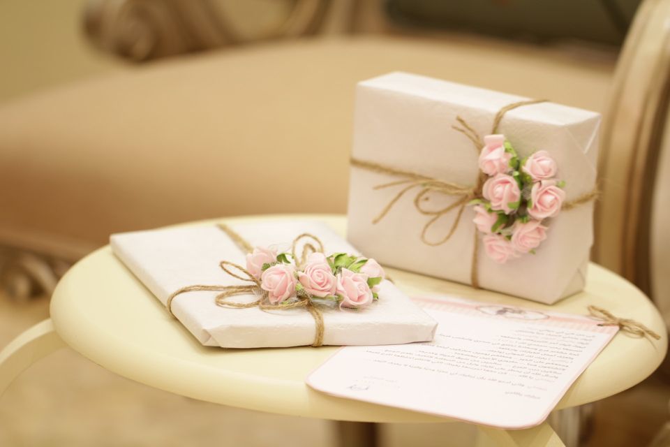 two gift-wrapped packages on a table